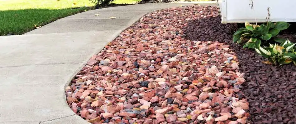 New rock installation by Sprout Lawn & Landscape at a home in Carmel.