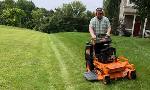 Sprout Lawn & Landscape mowing a lawn at a home in Noblesville, IN.