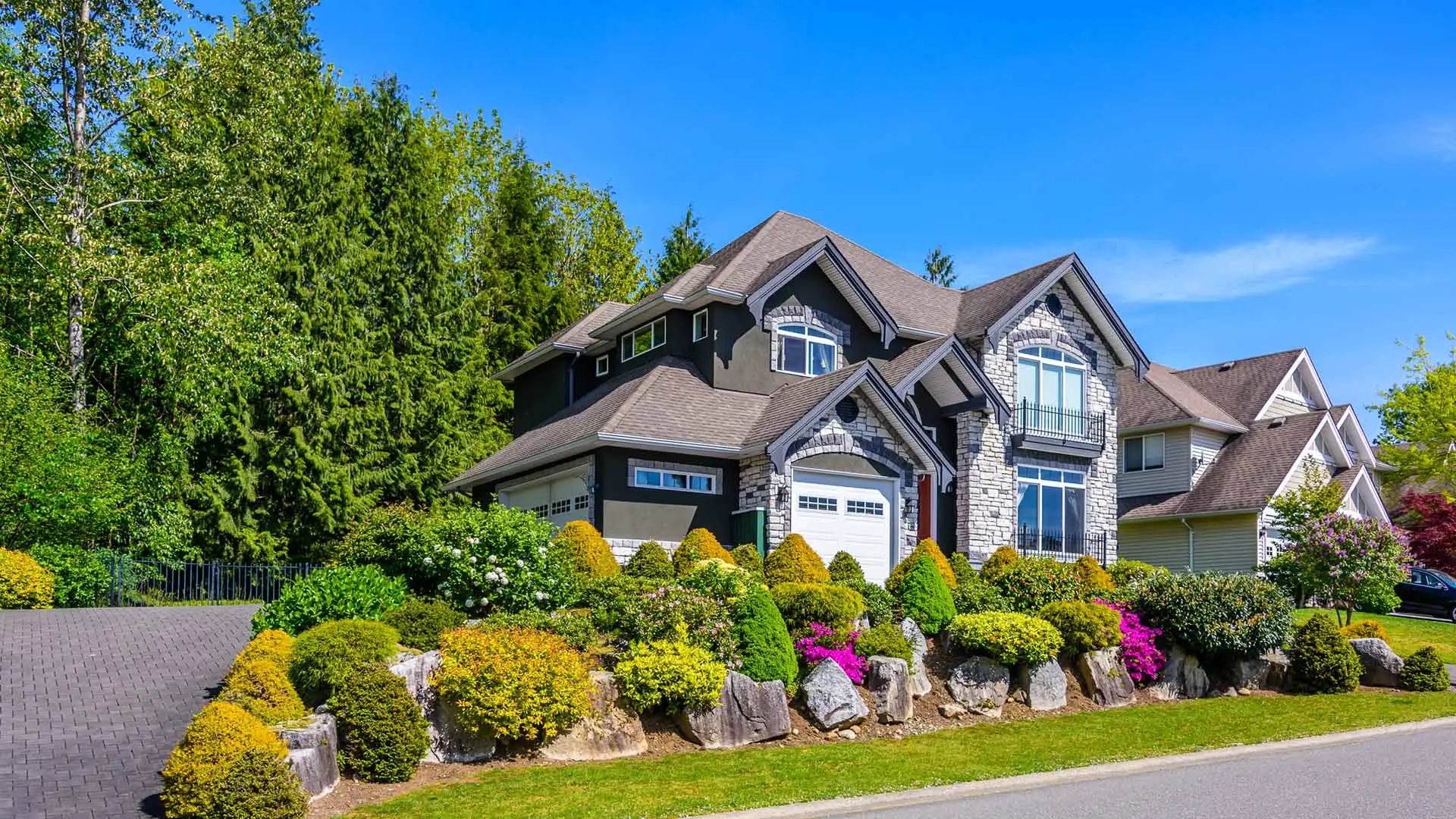 Home front with colorful landscape plants installed