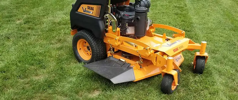 Zero turn lawn mower on a freshly mowed lawn